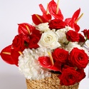 Квіти в кошику "Полум’яні обійми"